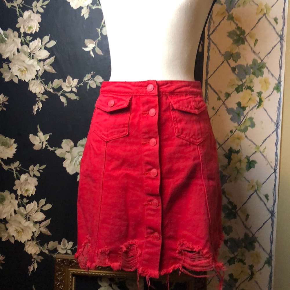Red ripped denim skirt